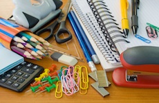 a variety of office supplies on a table