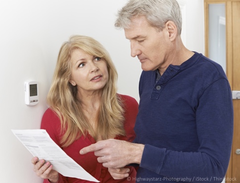 couple worrying about heating bill