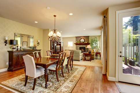 Traditional rug under dining table, in elegant setting