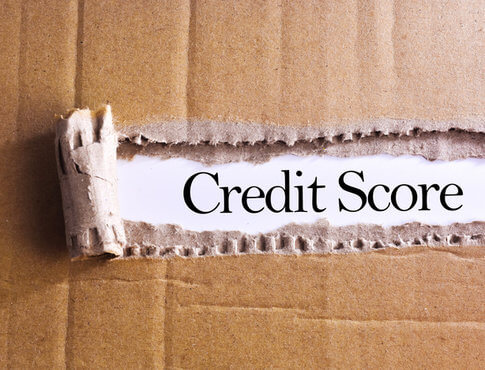 Credit score on torn cardboard box