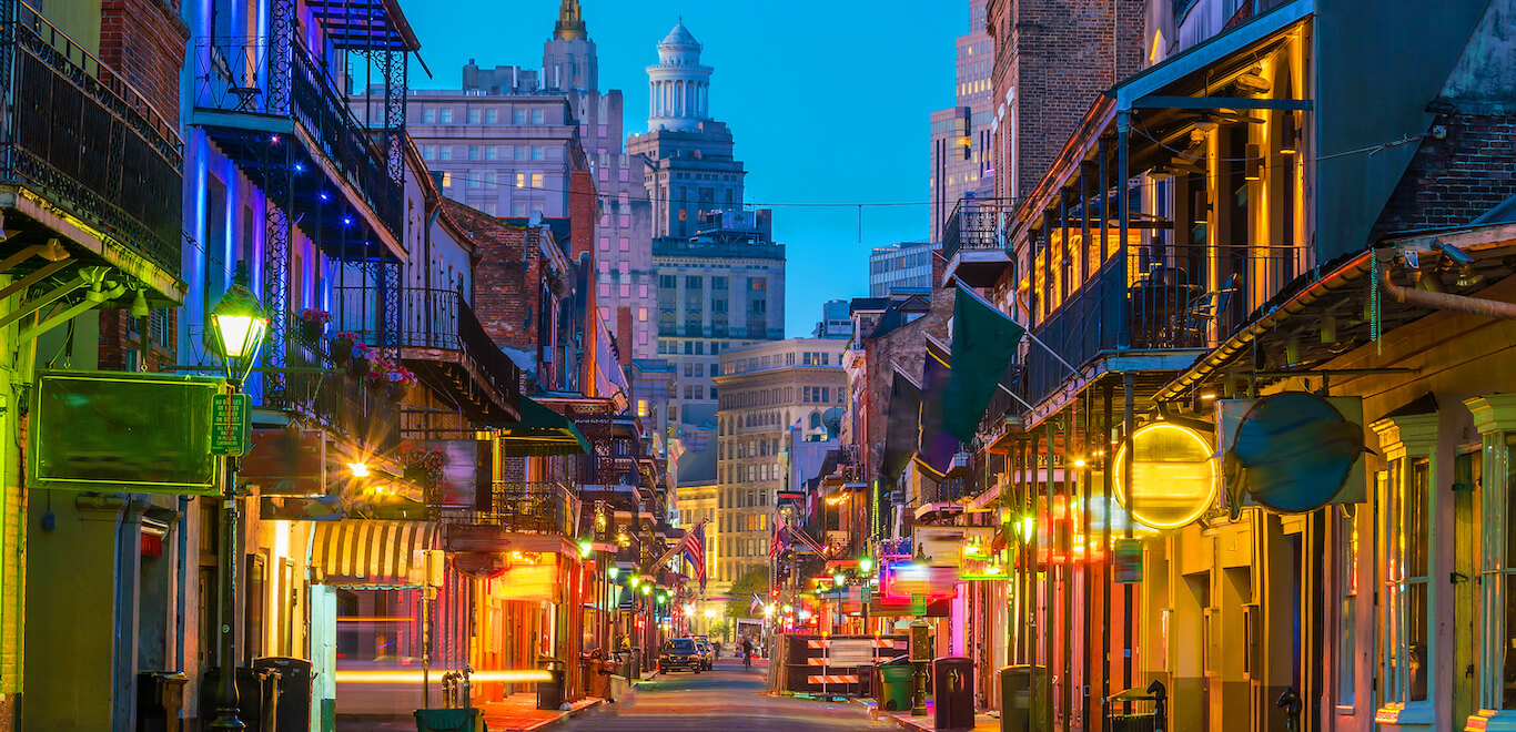 A nighttime shot of Bourbon Street in New Orleans, Louisiana.