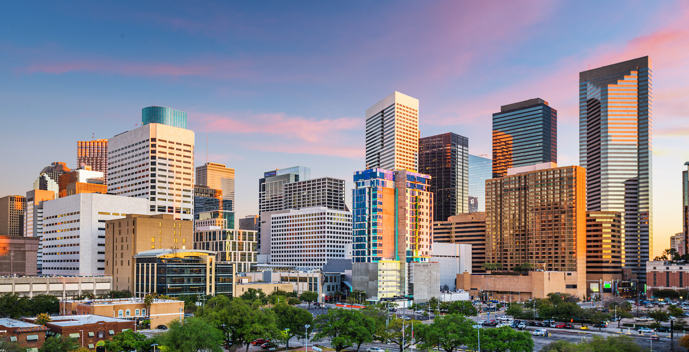 The cityscape of Houston, Texas at sunset.