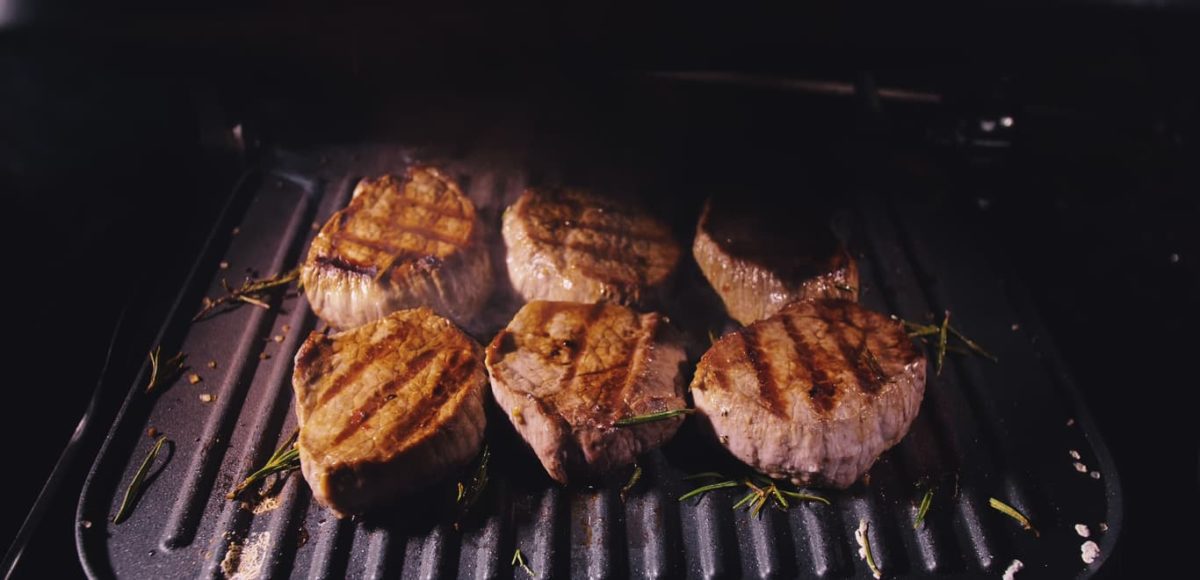 Juicy meat on a hot grill.