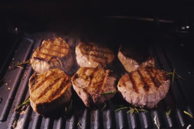 Juicy meat on a hot grill.