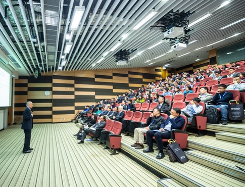 Professor lecturing in front of students