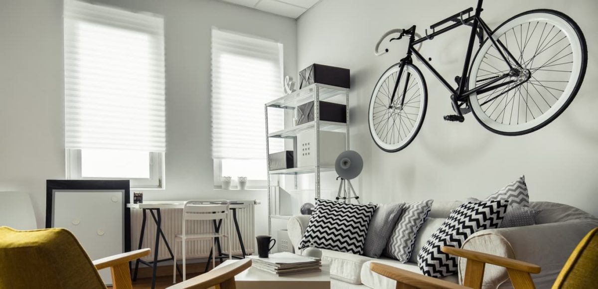 Bicycle hanging on the wall in living room