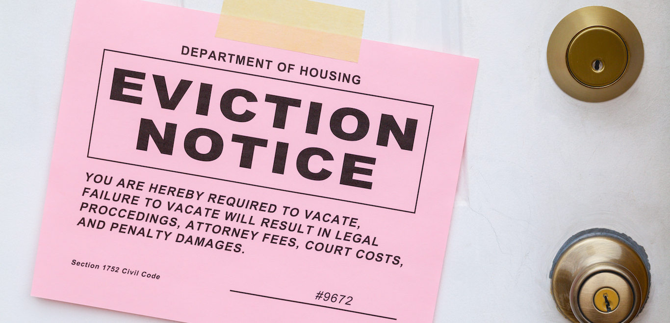 Pink eviction notice slip taped to door can a landlord kick you out