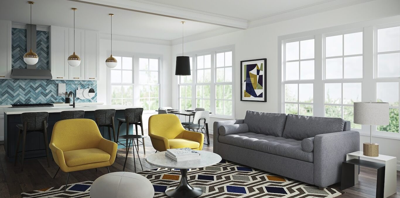 A bright apartment with grey furniture and yellow accents.